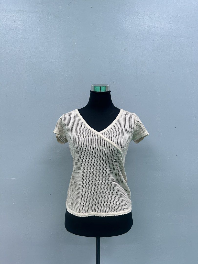Off-White Knit Short Sleeve Top (Category: Others Tops) located in Manila. Submitted by lindseyaaa (Listing ID 1467286109, Image 1). Description: Item Info: Brand: No brand Condition: Pre-loved / Ukay (Good condition) Size: Fits XS to Medium 📍Pickup/Shipping: Enrique M. Razon Sports Center, De La Salle University- Manila 💬 Message for inquiries or order reservation!.