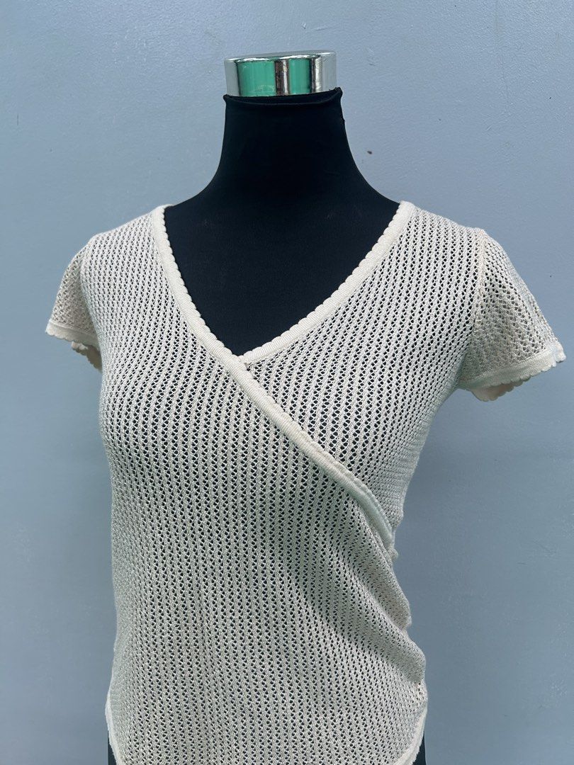 Off-White Knit Short Sleeve Top (Category: Others Tops) located in Manila. Submitted by lindseyaaa (Listing ID 1467286109, Image 2). Description: Item Info: Brand: No brand Condition: Pre-loved / Ukay (Good condition) Size: Fits XS to Medium 📍Pickup/Shipping: Enrique M. Razon Sports Center, De La Salle University- Manila 💬 Message for inquiries or order reservation!.