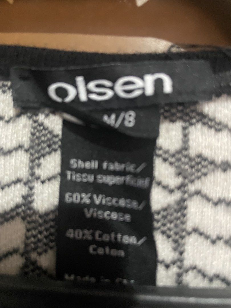 Olsen Black and White Patterned Zip Cardigan (Category: Coats, Jackets and Outerwear) located in Manila. Submitted by mochi_dear (Listing ID 1467209562, Image 3). Description: - Brand: Olsen - Size: M/8 - Color/Pattern: Black and white chevron leaf design - Material: 60% viscose, 40% cotton (super soft knit) - Features: Full two-way front zipper, two front pockets with black trim, ribbed black cuffs and hemline - Condition: Excellent pre-loved co