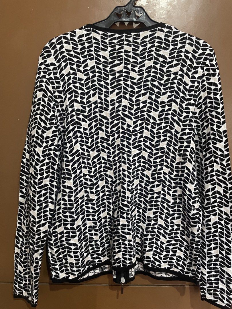 Olsen Black and White Patterned Zip Cardigan (Category: Coats, Jackets and Outerwear) located in Manila. Submitted by mochi_dear (Listing ID 1467209562, Image 2). Description: - Brand: Olsen - Size: M/8 - Color/Pattern: Black and white chevron leaf design - Material: 60% viscose, 40% cotton (super soft knit) - Features: Full two-way front zipper, two front pockets with black trim, ribbed black cuffs and hemline - Condition: Excellent pre-loved co