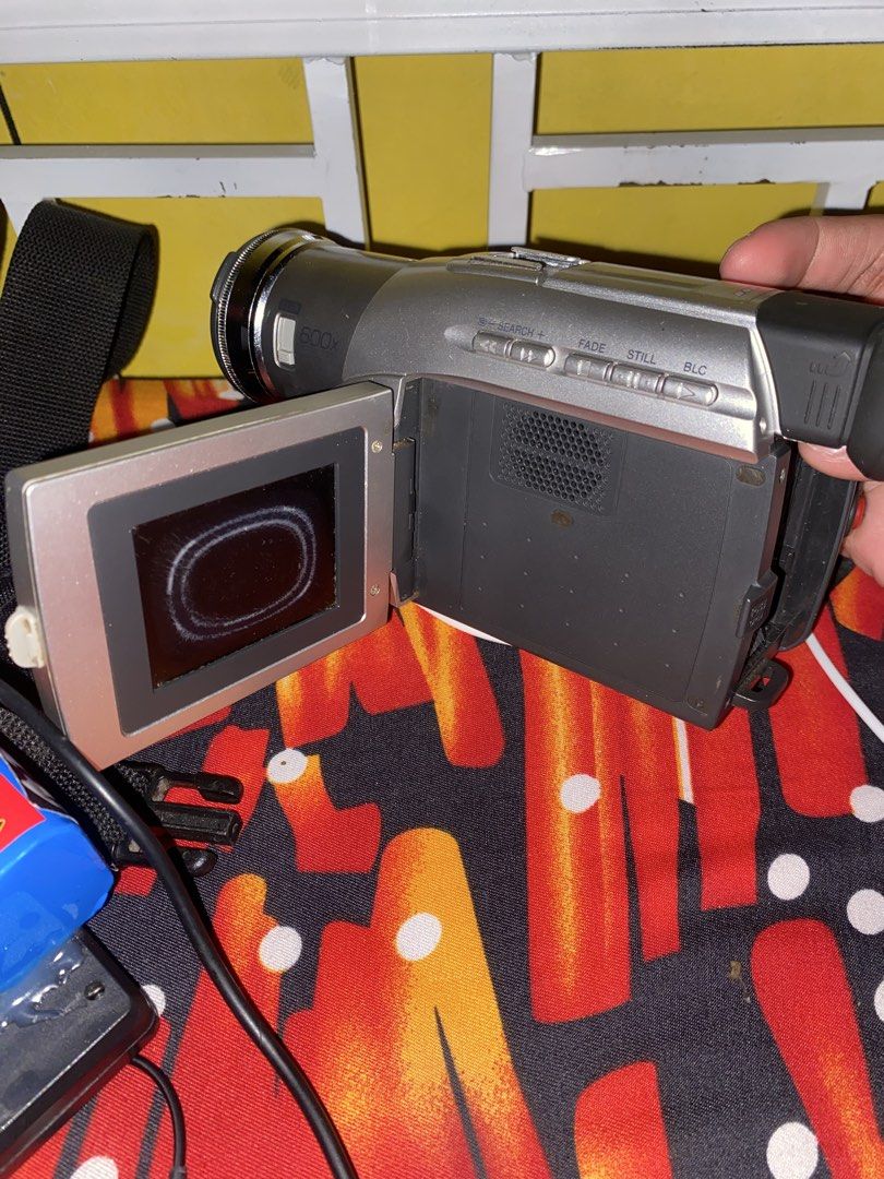 Olympus T-100 12 Megapixel Digital Camera / Panasonic (Category: Cameras) located in Manila. Submitted by princekheann (Listing ID 1467251290, Image 3). Description: - Model: Olympus T-100 (Black) - Resolution: 12 Megapixels - Zoom: 3x Optical Zoom - Display: Working rear LCD screen with clear settings display - Storage: Uses standard SD memory cards - Included: Attached grey wrist strap - Condition: Battery door and all buttons are intact and wo