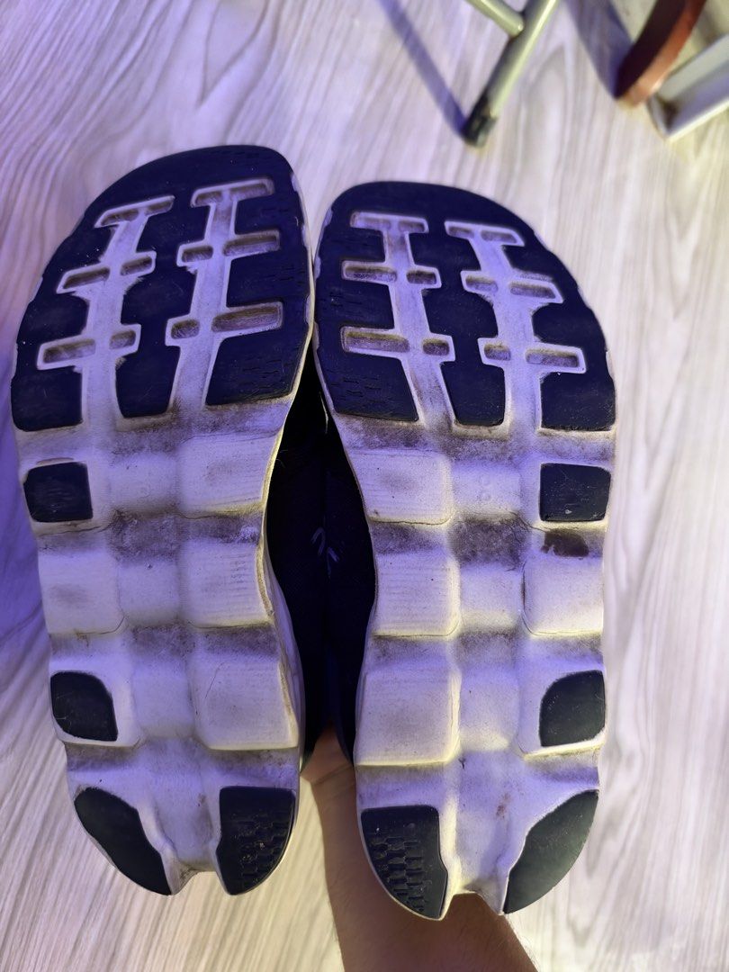 On Cloud Running Shoes Black White (Category: Sneakers) located in Caloocan City. Submitted by nic834427 (Listing ID 1467211181, Image 2). Description: - Brand: On Running Shoes - Color: Black and White - Features: Speed lacing system with toggle locks, signature CloudTec cushioned sole, and Swiss flag detail - Condition: Normal dust and wear from use, but soles and uppers still have plenty of life left - Best for: Comfortable daily trainers / ca