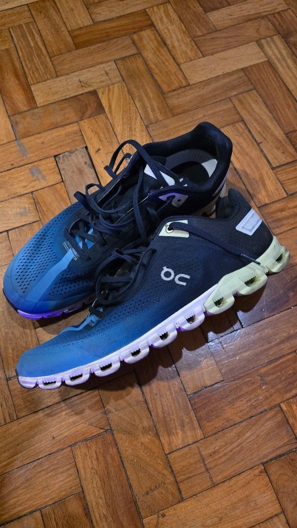 On Cloud Running Shoes Blue Black (Category: Sneakers) located in Pasig City. Submitted by johnflan (Listing ID 1467341920, Image 1). Description: On running shoes in a blue and black gradient colorway. Swiss engineering branding on the heel and tongue. Mesh upper construction with signature cloud cushioning pods on the sole. Lace-up closure with dark blue laces. Comfortable athletic footwear suitable for workouts or casual wear..