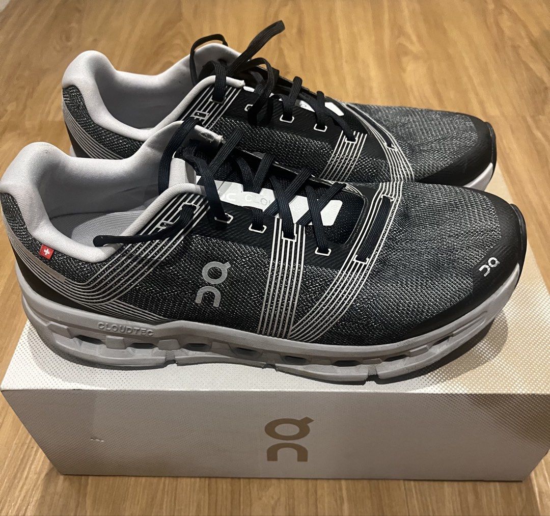 On Running Cloudgo Black White Shoes (Category: Sneakers) located in Pasig City. Submitted by gevyd (Listing ID 1467182282, Image 2). Description: - Brand: On Cloudgo - Colorway: Black and White - Size: Men's US 11.5 - Features: Swiss engineering design, CloudTec cushioning, breathable mesh upper, traditional lace-up closure - 9/10 Condition: Worn a few times, uppers and structure are clean and solid, soles have minor dirt from light use - Inclus