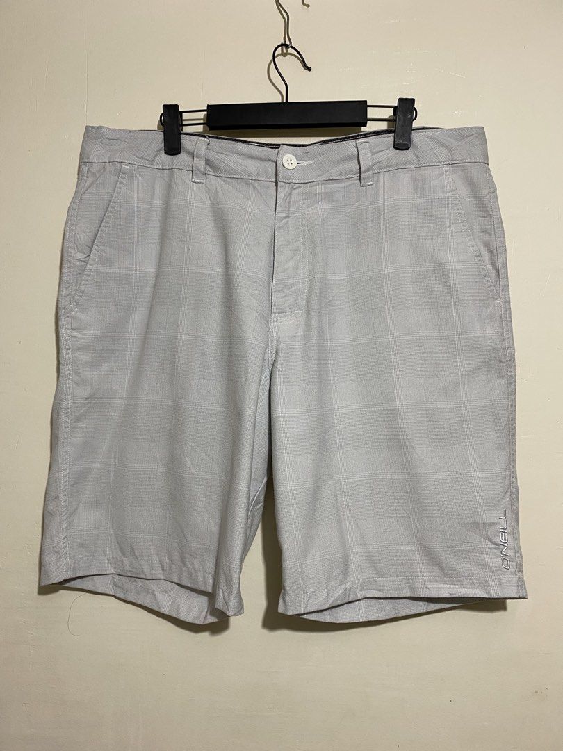 O'NEILL,Casual shorts (Category: Shorts) located in Cavite. Submitted by jc_thrift95 (Listing ID 1467336718, Image 1). Description: - a pair of O’Neill Men’s Carson Chino / Delta Flat-Front Casual Walkshorts in a gray plaid (check) pattern. - Made in INDIA - L- 21 inch - W- 19 inch - Color rate 8/10 - See picture details for dimes..