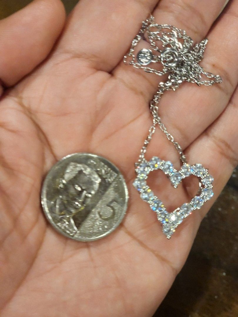 OPEN HEART NECKLACE (Category: Necklaces) located in Manila. Submitted by chrinathalie (Listing ID 1467245500, Image 2). Description: rhodium-platinum-whitegold plated setting item is tarnish resistant long lasting quality stone is ZIRCON (Sparkly and shiny like diamonds) ITEM IS NOT PAWNABLE.