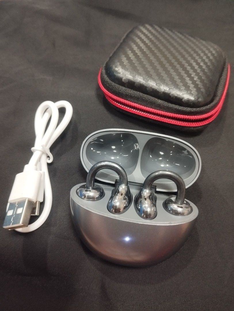 HONOR Choice Earbuds Clip - Titanium Arch Bridge | 36hrs Battery Life | Dual AI Noise Cancellation (Category: Earphones) located in Dagupan City. Submitted by nartleb_naan (Listing ID 1467351938, Image 1). Description: - Unique clip-on design open-ear wireless earbuds in sleek metallic dark grey - Ergonomic curved shape for all-day comfortable wear - Fully tested and working great with a solid battery life - Includes matching charging case and ch