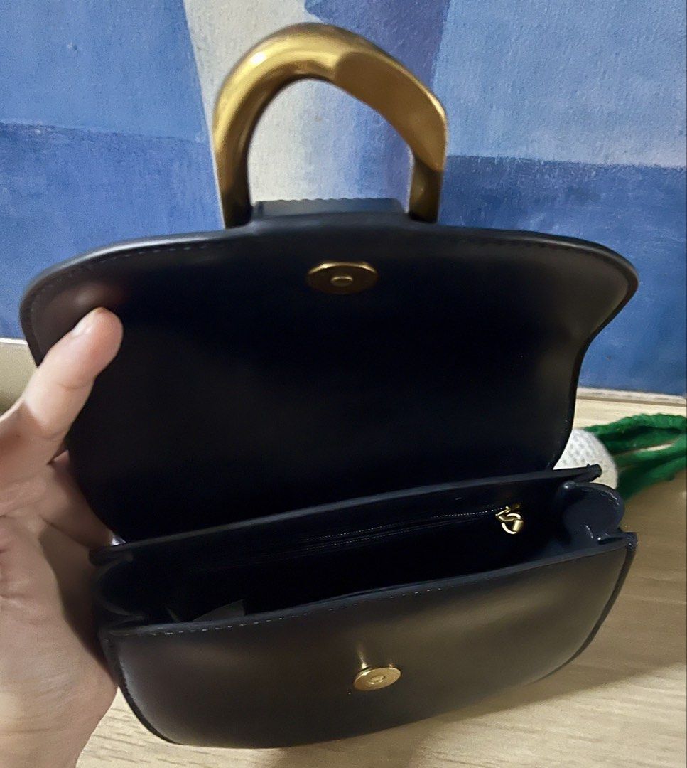 Original Charles & Keith sling bag (Category: Cross-body Bags) located in Quezon City. Submitted by madshoppe (Listing ID 1467280797, Image 3). Description: Like new No short sling included just the long one FIXED PRICE for this.
