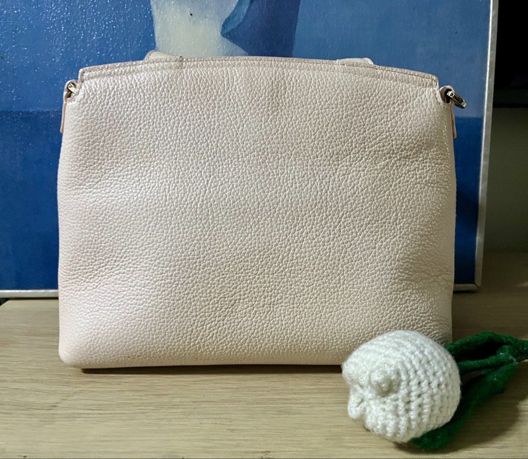 Original Furla sling bag (Category: Cross-body Bags) located in Quezon City. Submitted by madshoppe (Listing ID 1467259127, Image 2). Description: No flaws Light pink in person Small.