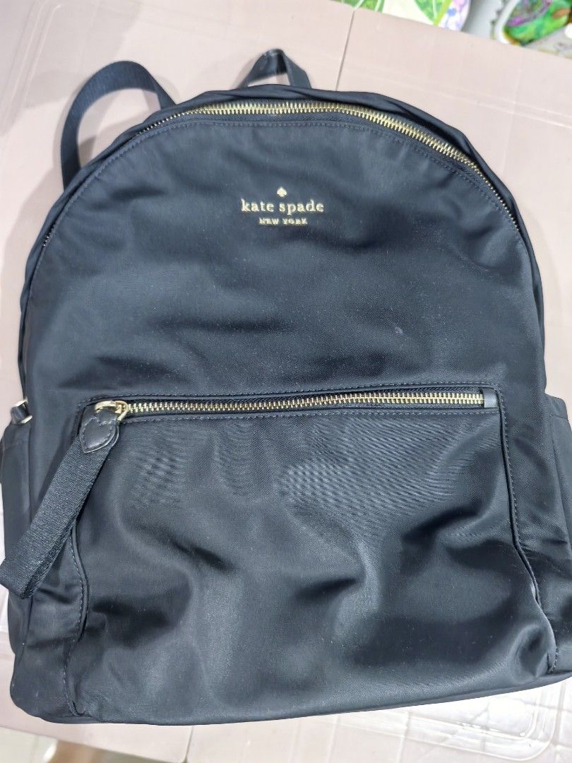 Original Kate Spade Backpack - Large (Category: Backpacks) located in Mandaluyong City. Submitted by razzleberry (Listing ID 1467174934, Image 2). Description: Price negotiable :) Original, bought from US Can fit 14-in laptop Very sturdy, used as laptop bag going to office and hand carry bag in flights Zippers are all working well Flaw - top grab handle is already damaged but only the leather part; support inside is still ok (see last photo).