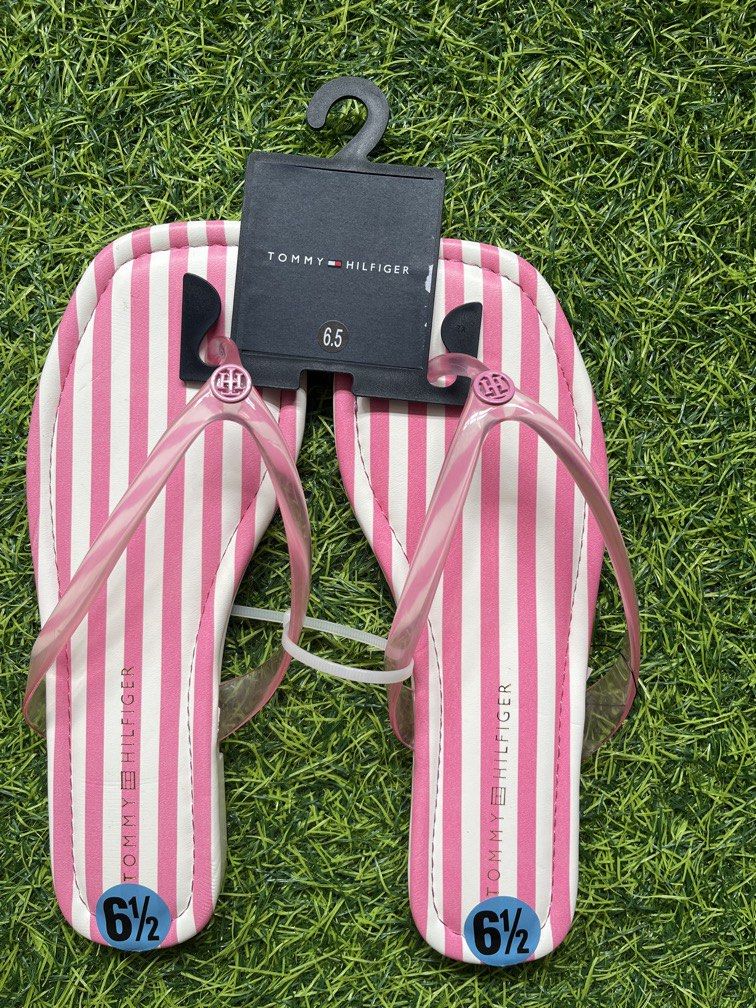 Original tommy hilfiger from u.s (Category: Slippers and slides) located in Manila. Submitted by ty_imported_goods (Listing ID 1467185794, Image 1). Description: Original from u.s Size: 6 1/2 But can be fit to size 5 to 6 1/2.