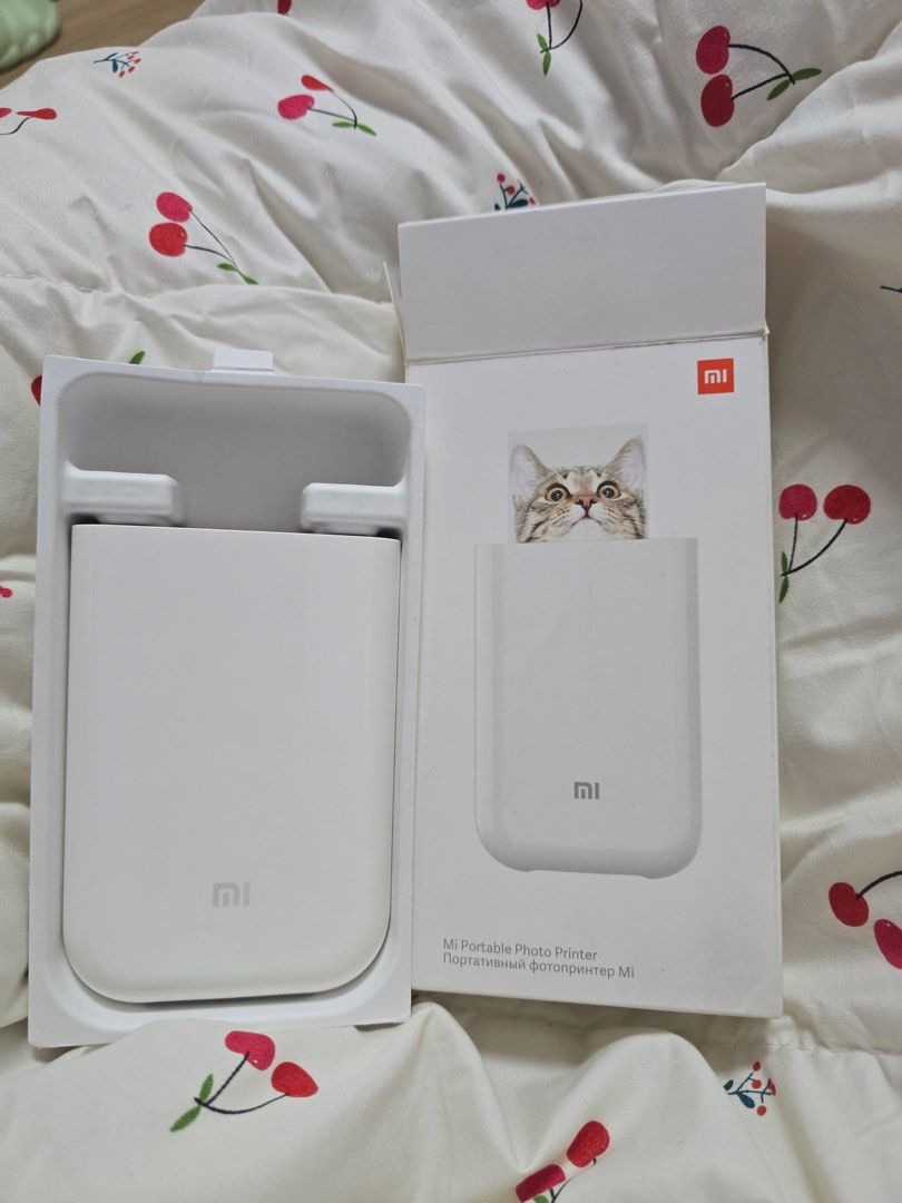 Original Xiaomi Portable Photo Printer (Category: Printers, Scanners & Copiers) located in Manila. Submitted by milleshoppppp (Listing ID 1467331009, Image 1). Description: Mi Portable Photo Printer Condition: 9/10 - no micro-usb and photopaper included but has box - all working well (check vids and photos for reference) Price: ₱1,650 (Still negotiable).