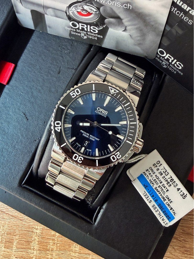 Oris Aquis Date Black Ceramic Bezel Blue Dial (Category: Men's Watches) located in Pasig City. Submitted by migspaggabao (Listing ID 1467224714, Image 1). Description: Oris Aquis Date Black Ceramic Bezel Blue Sunray Brushed Dial Ref. No. 01 733 7653 4135-07 8 26 01PEB Oris Calibre 733-1 41 Hours Power Reserve 43 mm case 9.7/10 condition. Mint! Dated yr 2017. Below SRP USD 1,950 (PHP 123k) Inclusions: watch, double box, manual, hang tag, guarantee