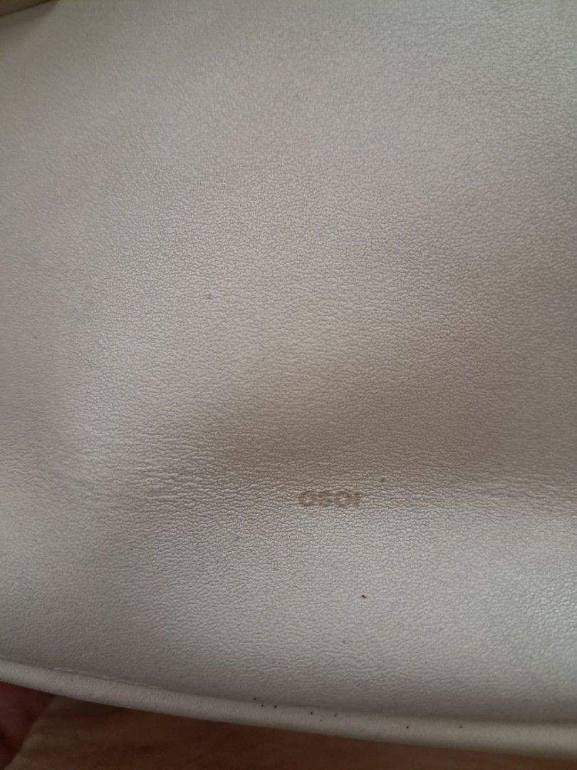 OSOI cream leather shoulder bag (Category: Cross-body Bags) located in Muntinlupa City. Submitted by msshoppingera (Listing ID 1467186753, Image 2). Description: OSOI genuine leather shoulder/crossbody bag. Off white/cream colour. Shows visible leather cracking along the folded side edges, but overall fully functional and clean inside. All items are available unless marked as sold. Payment first before shipping. Shipping fees will be shouldered b