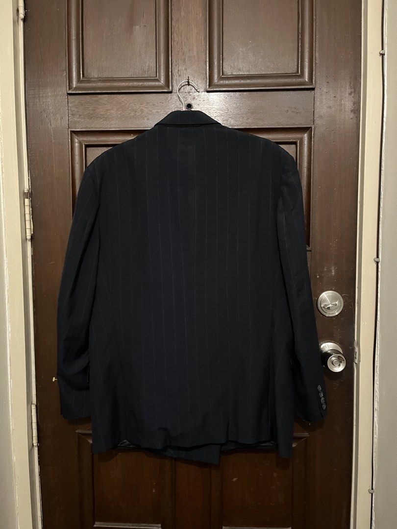 Oversized Suit Navy Blue (Category: Coats, Jackets and Outerwear) located in Makati City. Submitted by yoursecondbest (Listing ID 1467252923, Image 2). Description: - Color/Pattern: Navy blue with subtle pinstripes - Style: Double-breasted, classic 6-button front closure - Details: Structured shoulders, flap hip pockets, dark blue inner lining - Origin: Crafted in the USA from imported fabric - Care: Dry clean only - Versatility: Ideal for formal
