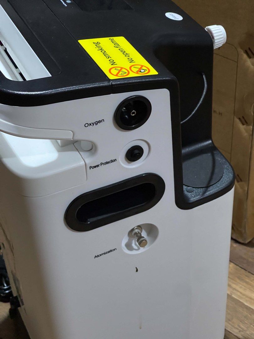 Owgels 5L Portable Oxygen Concentrator (Category: Medical Supplies & Tools) located in Quezon City. Submitted by ohnomary (Listing ID 1467250076, Image 3). Description: - Brand/Model: Owgels 5L Oxygen Concentrator (OZ-5-01TW0) - Condition: Clean unit, ready for home respiratory care setup - Key Features: Digital display, flow meter up to 5L/min, and rear oxygen/atomization ports - Manufacture Date: April 1, 2026 - Inclusion: Original cardboard bo