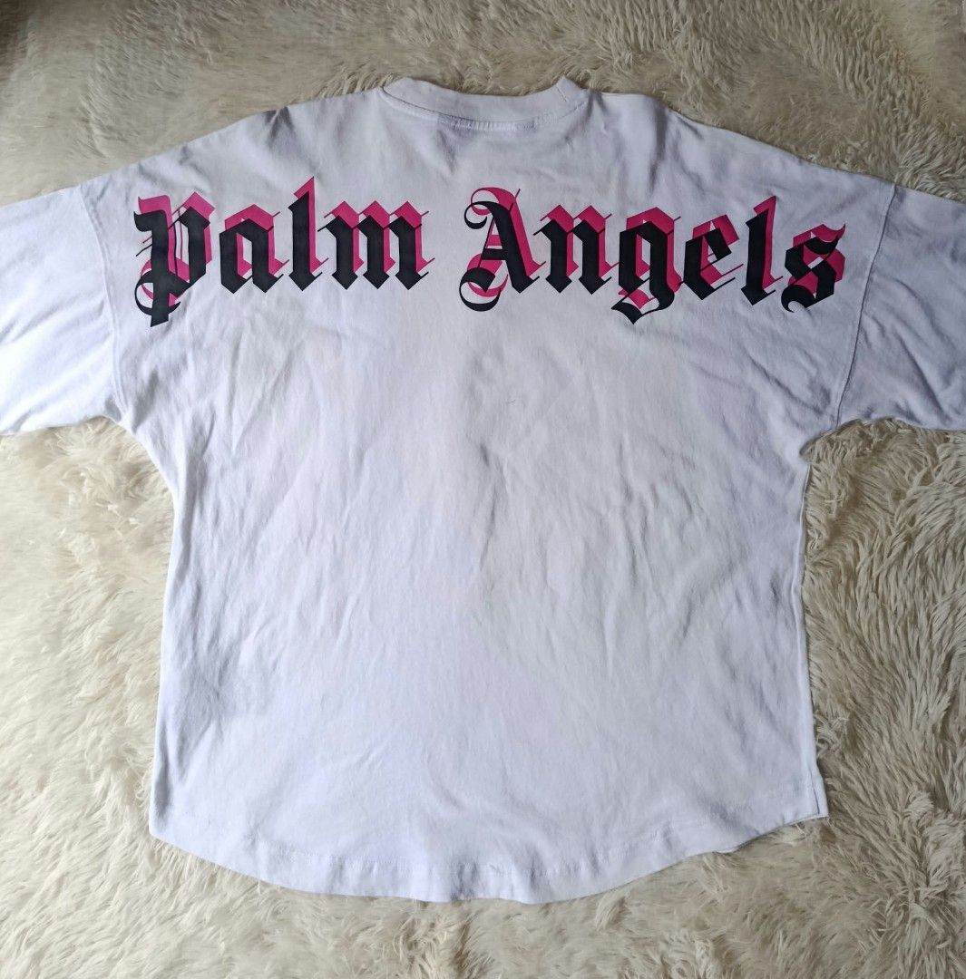 Palm Angels Double Logo Oversized Tee (Category: Activewear) located in Manila. Submitted by neil_sellingaccount (Listing ID 1467284819, Image 1). Description: size large 23 width 28 length 10/10 color rate very good condition issue: crackprints on neckline.