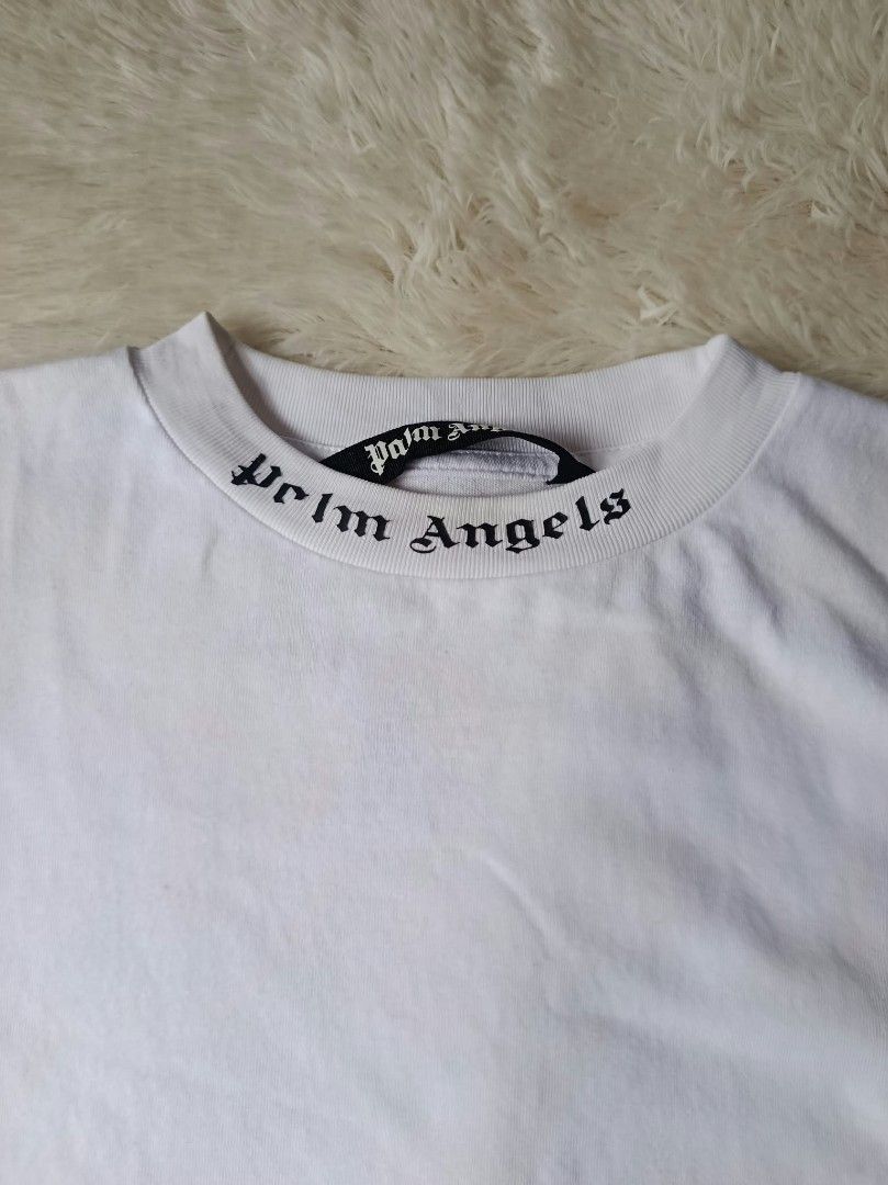 Palm Angels Double Logo Oversized Tee (Category: Activewear) located in Manila. Submitted by neil_sellingaccount (Listing ID 1467284819, Image 3). Description: size large 23 width 28 length 10/10 color rate very good condition issue: crackprints on neckline.