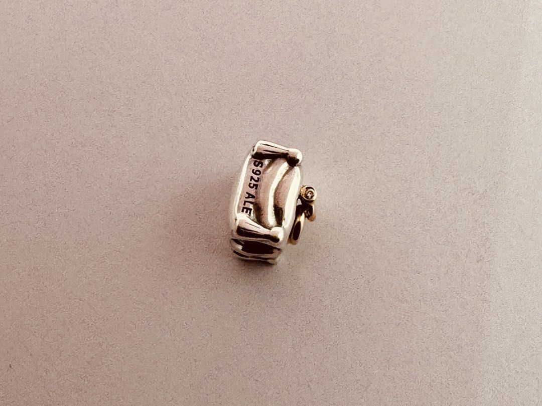 Pandora Romantic Union Diamond Charm (790549D) (Category: Charms) located in Cabanatuan. Submitted by water.withahintoflime (Listing ID 1467281560, Image 2). Description: Retired|Authentic Sterling silver | 14k gold rings | O.O2ct brilliant cut natural diamond 📍NOS|New Old Stock [May have some blemishes due age, handling and storage]. ✅ Packaging [box|bag|polishing cloth].