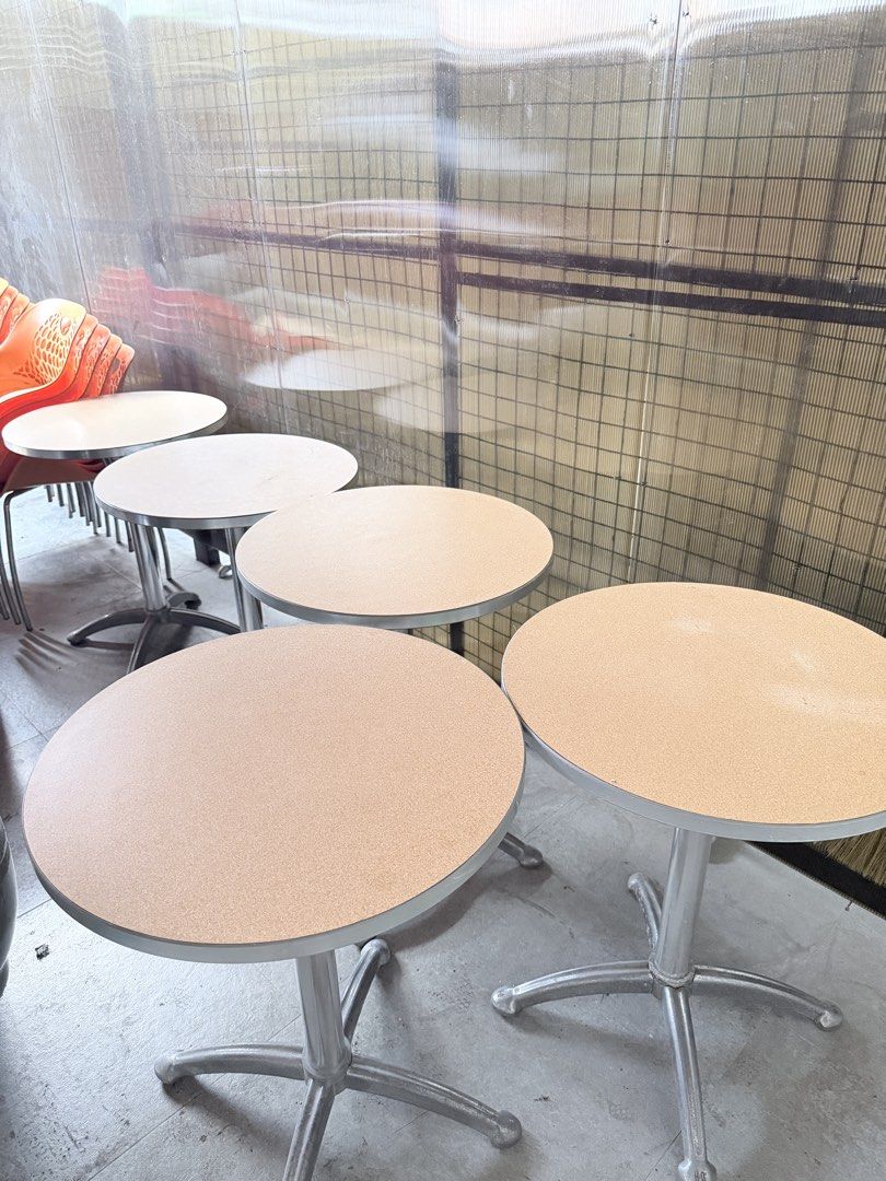 Pantry / Canteen Round Table (Category: Tables & Sets) located in Quezon City. Submitted by happyquailegg (Listing ID 1467176348, Image 3). Description: Pantry / Canteen Round Table Table top size: 60cm Height 74cm Minor scratches (signs of usage) Slightly faded bottom table frame ₱1200 each ₱1100 each if 3 pcs up ₱1000 each if take all (7pcs) Location: Alta Vista Homes, Reparo Rd. Caloocan City Mode of payment BPI, Gcash, Maya Shipping: Lalamove