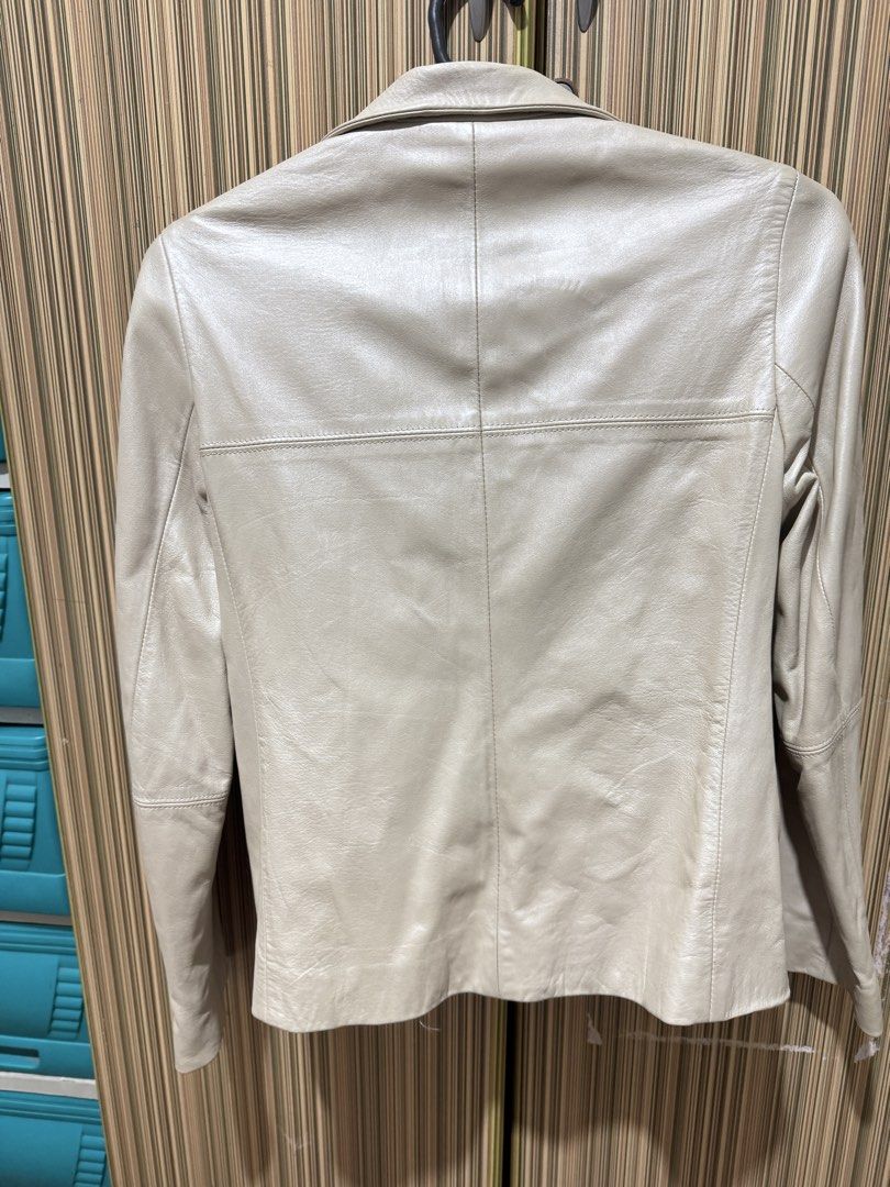 PARFAIT Leather Jacket Off-White Size S (Category: Coats, Jackets and Outerwear) located in Manila. Submitted by chie04_875 (Listing ID 1467190692, Image 3). Description: - Brand: PARFAIT - Style: Leather jacket - Color: Off-white / Cream - Size: S - Design: High collar, front zip with snap flap placket, horizontal seam details, and paneled construction - Fit: Great piece for layering.