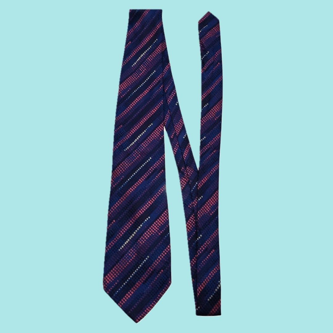 Paul Smith Silk Necktie (Category: Ties) located in Tarlac. Submitted by senkustuff (Listing ID 1467305019, Image 2). Description: - Brand: Paul Smith - Origin: Made in Italy - Material: 100% Silk - Design: Blue base with diagonal stripes of pink and white polka dots - Feature: Signature patterned tipping lining inside the tail - Width: Classic professional width.