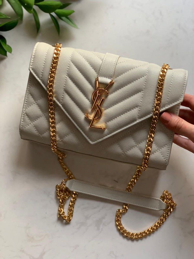 Pearl White Envelope Bag🤎 (Category: Cross-body Bags) located in Manila. Submitted by anneprlvdbgs (Listing ID 1467176715, Image 1). Description: Huyyyyy iget nyo tu mga sis before its too late😂 5k dapat tu, unahan lang mga sis first to pay. Sobrang ganda. Ysl Envelope 22cm🤎 📌Japan Auction Source 📌LIKE NEW/ in excellent condition 📌 ACTUAL PHOTO POSTED. What you see is exactly what you get. MOP: GCASH, Maribank & BDO QR MOD: Same day deliver