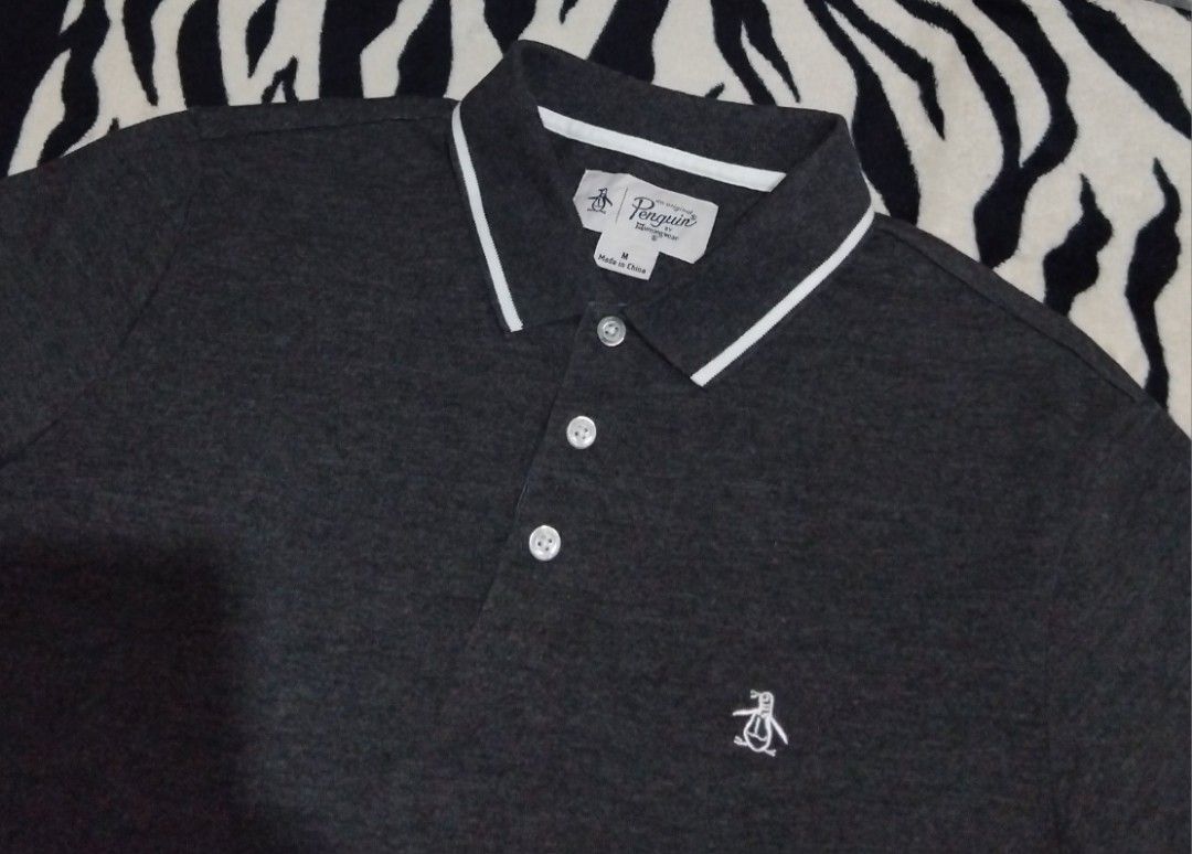 Penguin (Category: Formal Shirts) located in Davao. Submitted by chedrick1026 (Listing ID 1467217060, Image 3). Description: Original Penguin Twin Tapped Poloshirt Size Medium Dimension 20 x 28 Good As New Condition(Ganda Ng Tela) Color Rate 10/10 Dark Gray Colorway No Issue/Legit Pm/Loc Davao City.