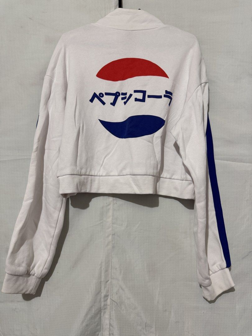 pepsi white crop track jacket (Category: Coats, Jackets and Outerwear) located in Quezon City. Submitted by riexomt (Listing ID 1467271958, Image 2). Description: - white cropped track jacket pepsi h&m collab - blue stripe detail on both sleeves - japanese lettering at back (bought in japan) - fill zip front with circle ring zipper - high collar neckline with ribbed cuffs - for casual streetwear and y2k!.
