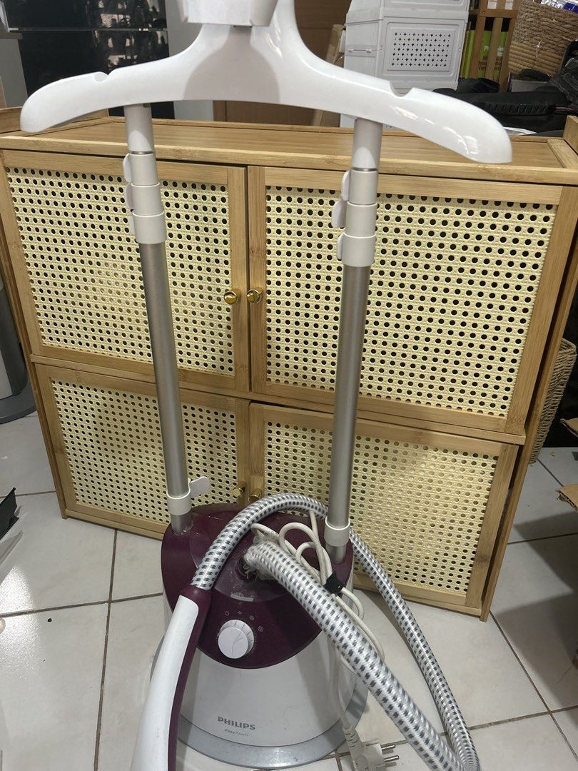 Philips EasyTouch Garment Steamer (Category: Irons & Steamers) located in Paranaque City. Submitted by quellaram (Listing ID 1467215268, Image 1). Description: Selling a Philips EasyTouch garment steamer in white and maroon. - either for repair or use parts that ate okay.