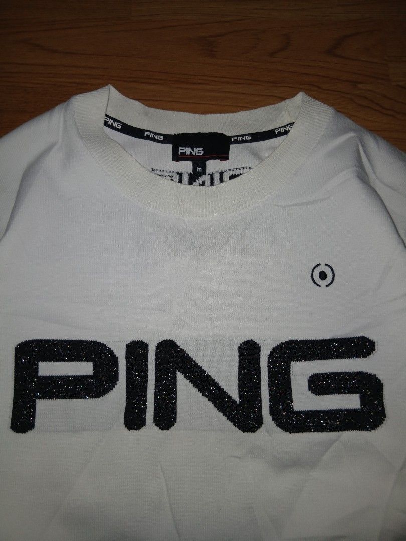 PING White Long Sleeve Golf Sweater Size M (Category: Coats, Jackets and Outerwear) located in General Santos City (Dadiangas). Submitted by afsph1996 (Listing ID 1467273088, Image 3). Description: - Brand: PING Golf Knittes L/S - Color: White - Size: Medium (tag attached) -Dimes 21W 27L - Design: Large sparkling PING logo on the front and small logo lettering on the back collar - Material: Comfortable polyester and nylon blend - Details: Knit te