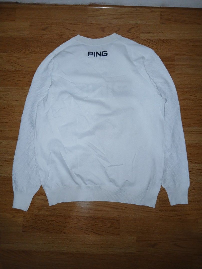 PING White Long Sleeve Golf Sweater Size M (Category: Coats, Jackets and Outerwear) located in General Santos City (Dadiangas). Submitted by afsph1996 (Listing ID 1467273088, Image 2). Description: - Brand: PING Golf Knittes L/S - Color: White - Size: Medium (tag attached) -Dimes 21W 27L - Design: Large sparkling PING logo on the front and small logo lettering on the back collar - Material: Comfortable polyester and nylon blend - Details: Knit te