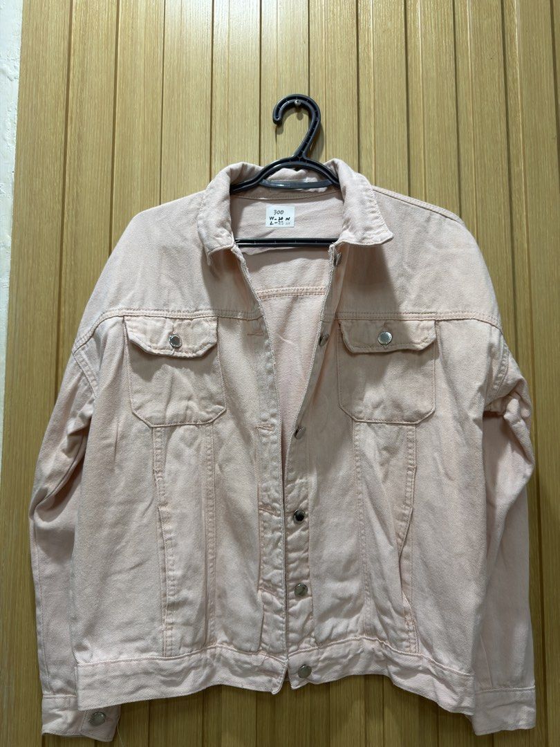 Pink Denim Jacket (Category: Coats, Jackets and Outerwear) located in Bacoor. Submitted by preloved_with_love_ (Listing ID 1467335170, Image 2). Description: Light pink denim jacket with silver buttons and front pockets. Tag attached shows measurements: width 20 inches, length 23 inches. Classic button-up style with collar. Easy to layer over tees or dresses. Casual everyday piece..