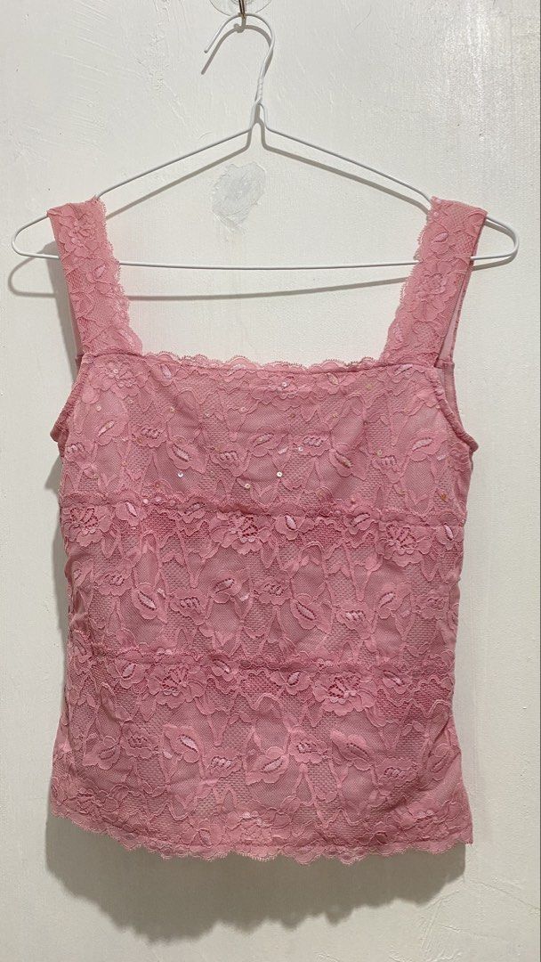 Pink Lace Sequin Tank Top Camisole (Category: Sleeveless) located in Ozamiz City. Submitted by carisclosetcleanup (Listing ID 1467243169, Image 1). Description: - Style: Pink lace camisole top with a trendy square neckline and wide straps - Details: Subtle sequins on the upper front panel with a layered floral lace pattern - Comfort: Fully lined interior for a smooth and comfortable fit - Versatility: Perfect for casual everyday wear or easily dr
