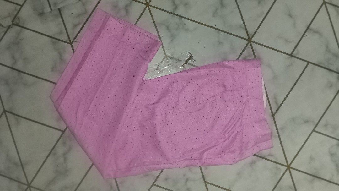 Pink wide-leg trousers with dotted pattern (Category: Jeans) located in Rizal. Submitted by akosilelouh71119 (Listing ID 1467178273, Image 1). Description: - Sandro tourser -wid 26 -lenght 44 -leg opening 9 -thight 12 Color: Pink with subtle dotted pattern - Fit: Relaxed, straight cut, wide-leg - Details: Structured waistband and neat front pressed creases - Versatility: Easy to dress up for work/events or keep casual for daily wear - Condition: 