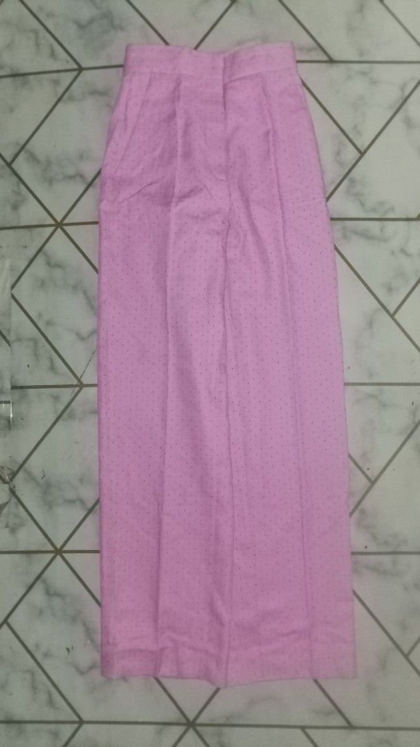 Pink wide-leg trousers with dotted pattern (Category: Jeans) located in Rizal. Submitted by akosilelouh71119 (Listing ID 1467178273, Image 2). Description: - Sandro tourser -wid 26 -lenght 44 -leg opening 9 -thight 12 Color: Pink with subtle dotted pattern - Fit: Relaxed, straight cut, wide-leg - Details: Structured waistband and neat front pressed creases - Versatility: Easy to dress up for work/events or keep casual for daily wear - Condition: 