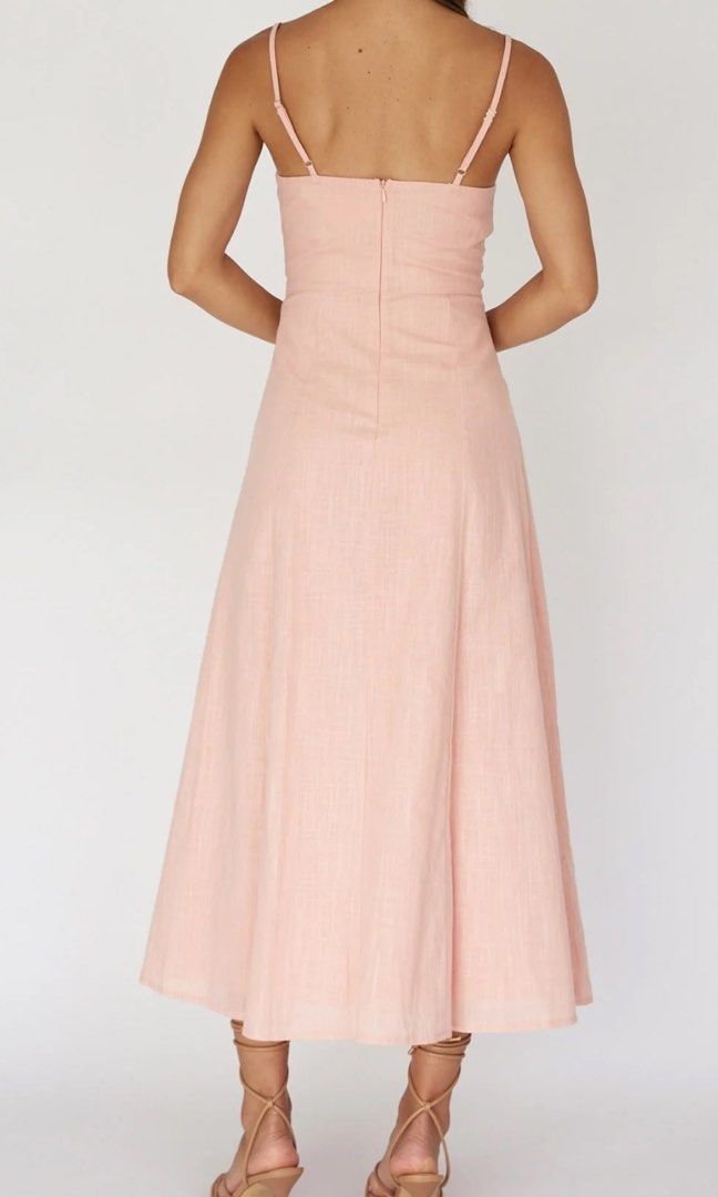 Pleat Midi Dress XS (Category: Dresses) located in Manila. Submitted by m.prelov (Listing ID 1467328652, Image 3). Description: - Style: Long pink maxi dress with spaghetti straps - Design: Sweetheart neckline and structured corset bodice detailing - Length: Ankle-length - Condition: Worn once, zero flaws, super clean and ready to wear - Perfect for: Parties, weddings, and formal events.