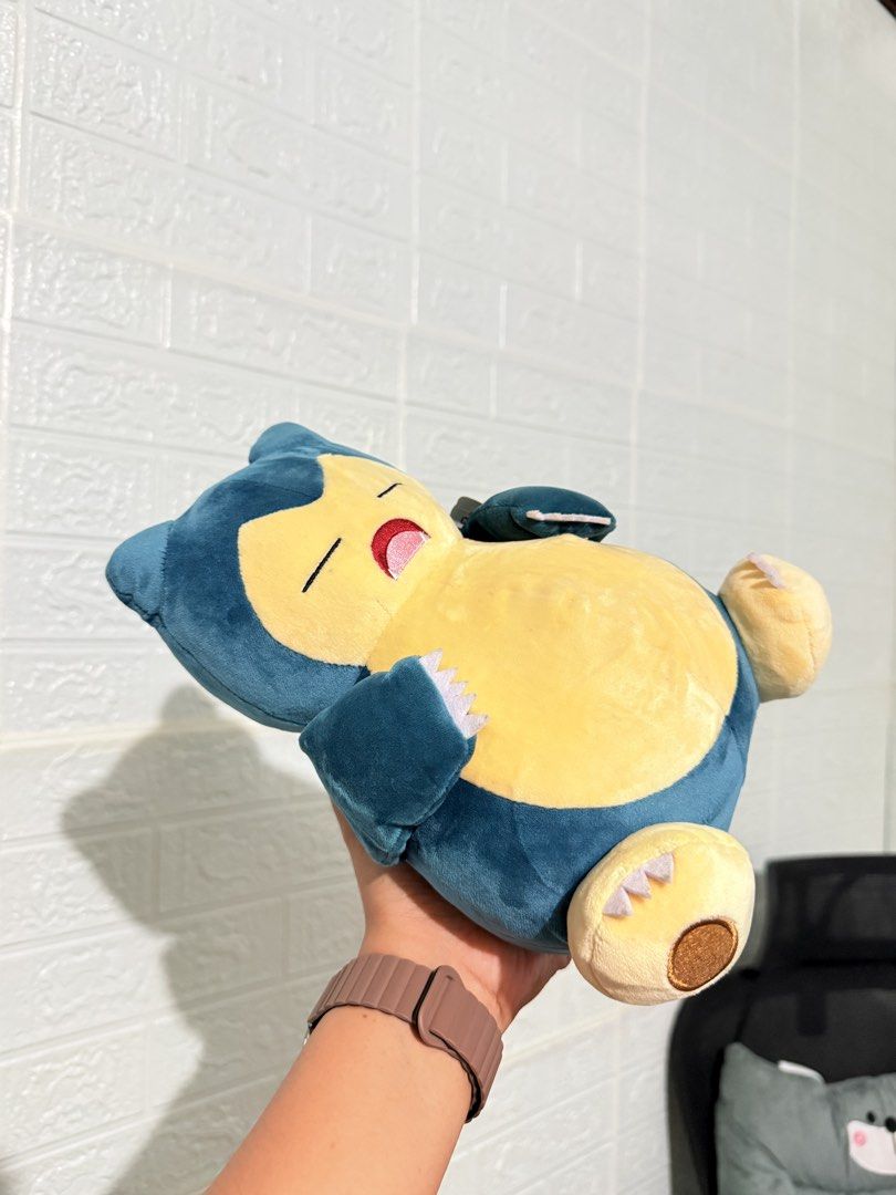 Pokémon Snorlax Plush Toy Soft (Category: Plushies & Soft Toys) located in Cavite. Submitted by projectplushie (Listing ID 1467264479, Image 2). Description: - Super soft fabric with a cute chubby belly and embroidered sleepy face - Sits upright easily on its own - Clean, flawless condition – perfect for gifts or collectors!.