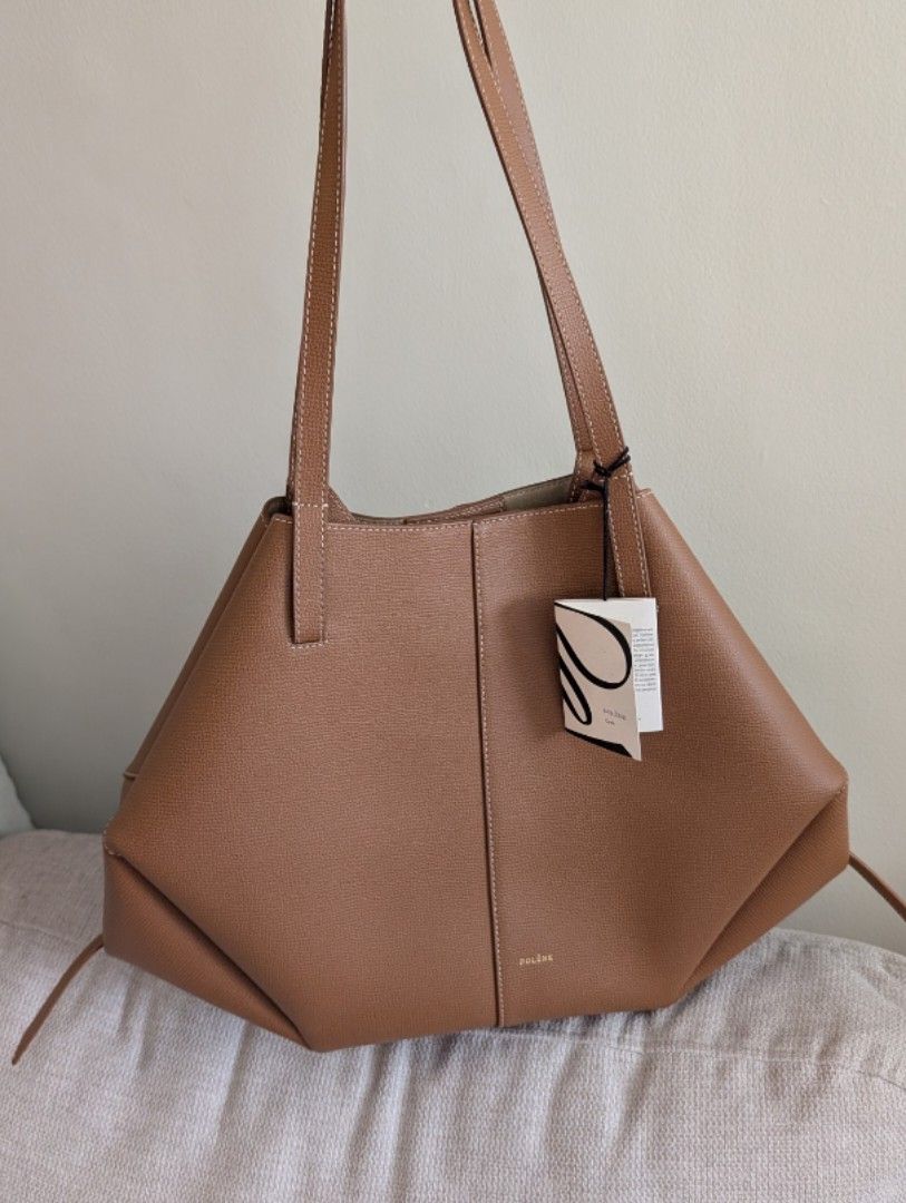 Polene Cyme good as new w/ receipt (Category: Tote Bags) located in Mandaluyong City. Submitted by kiraboo (Listing ID 1466877729, Image 1). Description: - Polène Cyme Regular Size - with tag - with digital proof of purchase - with dustbag - no box - dm for more photos - used once - Very good pristine condition - looks brand new RFS Decluttering - size not for me.