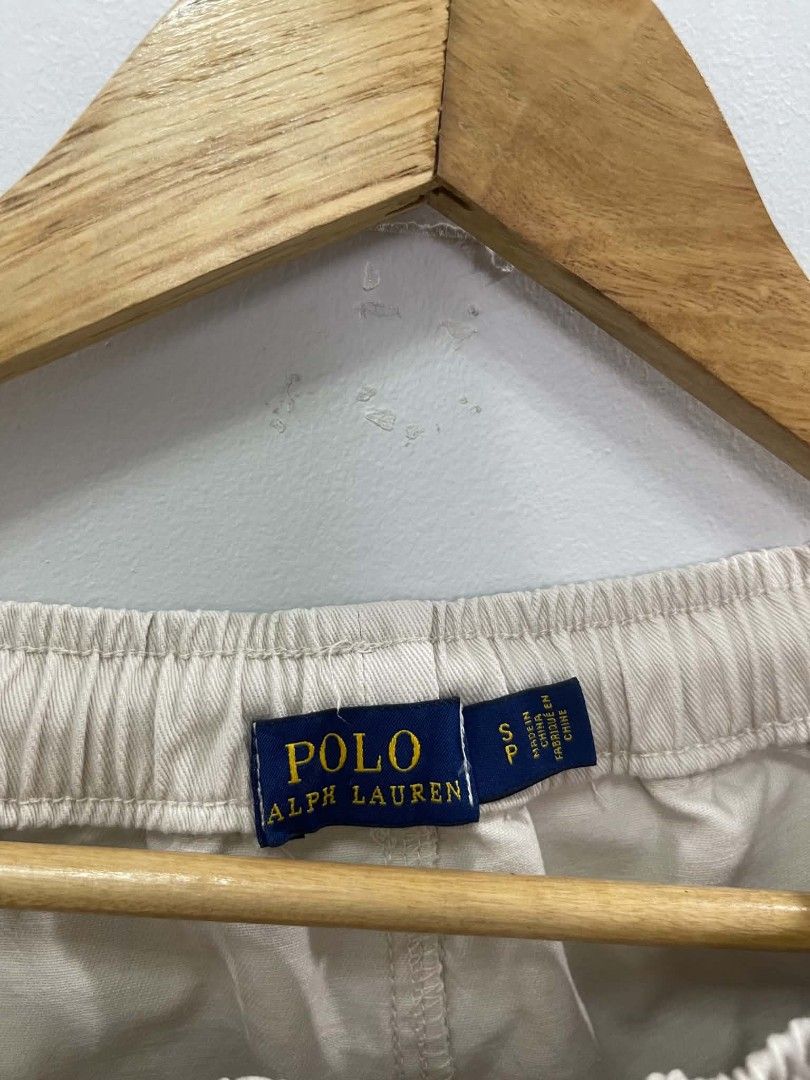 Polo Ralph Lauren Cream Drawstring Shorts Size S (Category: Shorts) located in Manila. Submitted by daleqt (Listing ID 1467220037, Image 2). Description: - Brand: Polo Ralph Lauren - Size: S - Material: 100% Cotton - Color: Cream - Details: Elastic waistband with drawstring, iconic blue pony logo near the hem, and two side pockets.
