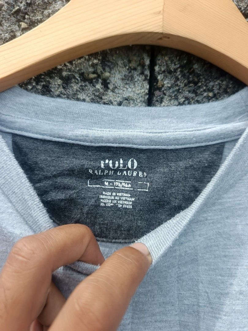 Polo Ralph Lauren Gray Sweatshirt Size M (Category: Coats, Jackets and Outerwear) located in Manila. Submitted by coyyimpothrift2 (Listing ID 1467217710, Image 2). Description: - Brand: Polo Ralph Lauren - Color: Grey - Size: Medium (tag printed inside collar) - Style: Long sleeve crew neck sweatshirt with small embroidered chest logo - Material: Comfortable cotton blend with ribbed cuffs and hem - Origin: Made in Vietnam - Condition: Clean, well