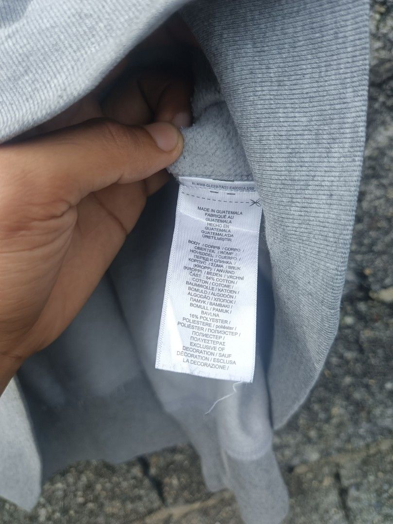 Polo Ralph Lauren Grey Hoodie Medium (Category: Coats, Jackets and Outerwear) located in Manila. Submitted by coyyimpothrift2 (Listing ID 1467217612, Image 3). Description: - Brand: Polo Ralph Lauren (Authentic Denim Goods line) - Color: Grey - Size: Medium - Logo: Signature embroidered pony on the chest - Features: Drawstring hood, front kangaroo pocket, ribbed cuffs - Material: Cotton and polyester blend with soft inner lining - Fit: Relaxed ev