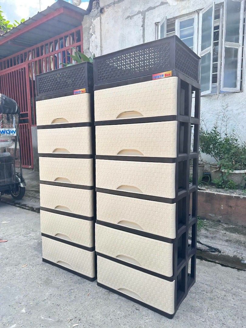 Power Box 6-Tier Plastic Storage Drawer Cabinets (Category: Shelves, Cabinets & Racks) located in Manila. Submitted by omsiminingiri3122 (Listing ID 1467336537, Image 1). Description: - Set of 2 heavy-duty plastic storage(each) abinets (sold as a pair or individually) - Stylish dark brown frames with textured cream-colored drawer fronts - 6 spacious drawers per tower for maximum storage - Integrated top basket compartments for extra organization 