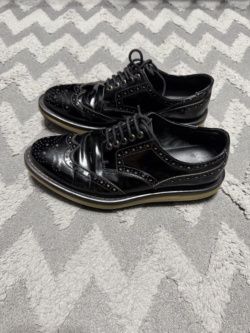 Prada - black Leather Wing tip shoes (Category: Casual Shoes) located in Cavite. Submitted by commoncourtesy (Listing ID 1467344218, Image 2). Description: Size 5 fits 7 mens.