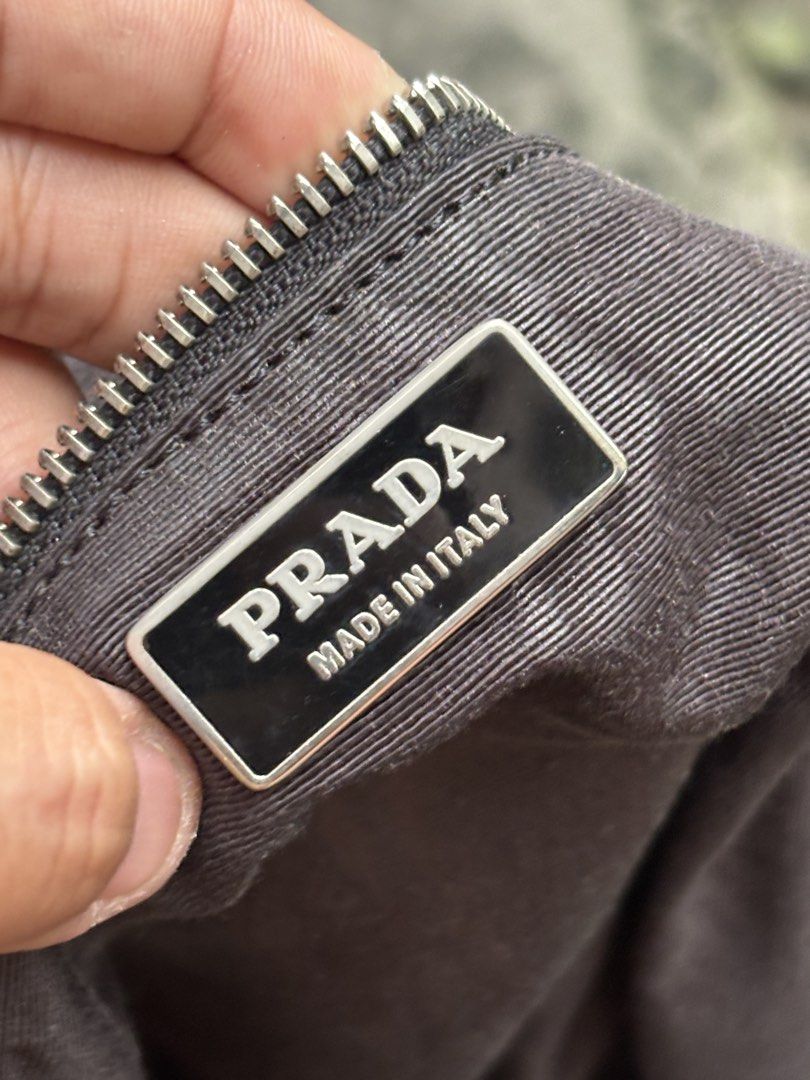 Prada Black Nylon Shoulder Bag (Category: Luxury Bags & Wallets) located in Bacolod City. Submitted by money_maker06 (Listing ID 1467299450, Image 3). Description: Prada Shoulder Bag •Riri Underzipper •Missing White Tag and Strap •Condition: Well Used/Used •Price: 3999 .