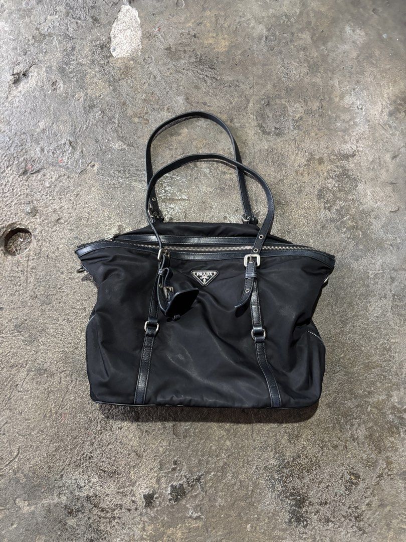 Prada Black Nylon Shoulder Bag (Category: Luxury Bags & Wallets) located in Bacolod City. Submitted by money_maker06 (Listing ID 1467299450, Image 1). Description: Prada Shoulder Bag •Riri Underzipper •Missing White Tag and Strap •Condition: Well Used/Used •Price: 3999 .