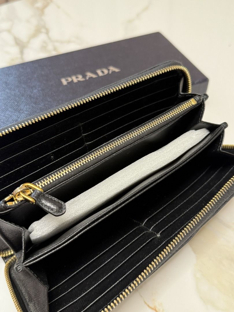 Prada Black Wallet (Category: Luxury Bags & Wallets) located in Marikina City. Submitted by tashdeclutters. (Listing ID 1467314935, Image 3). Description: ✨ Prada Black Wallet - P15,990 ✨ Condition: 3 - Good/Lightly Used 🛍️ Purchased in: Japan ✨ @tashdeclutters ✨ Created to share the things that no longer spark joy with Tash — and hopefully, let them spark joy for someone else. 🤍 📌 SHOP POLICIES • Prices posted are FINAL. • NO LOWBALLERS. If y