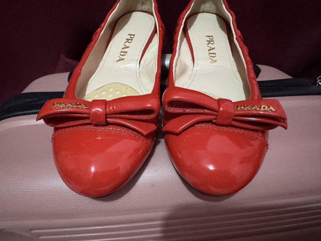Prada red shoes (Category: Sneakers & Footwear) located in Makati City. Submitted by chariz509 (Listing ID 1467335940, Image 2). Description: with signs of use what you see is what you Get .