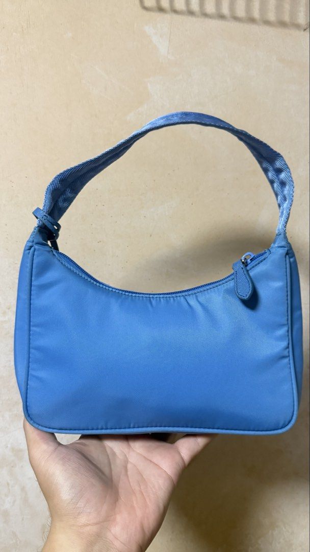 Prada Re-Edition 2000 Nylon Shoulder Bag (Category: Luxury Bags & Wallets) located in Calamba. Submitted by ashvault (Listing ID 1467189275, Image 3). Description: Looks new, just needs a little cleaning. Price still negotiable. .