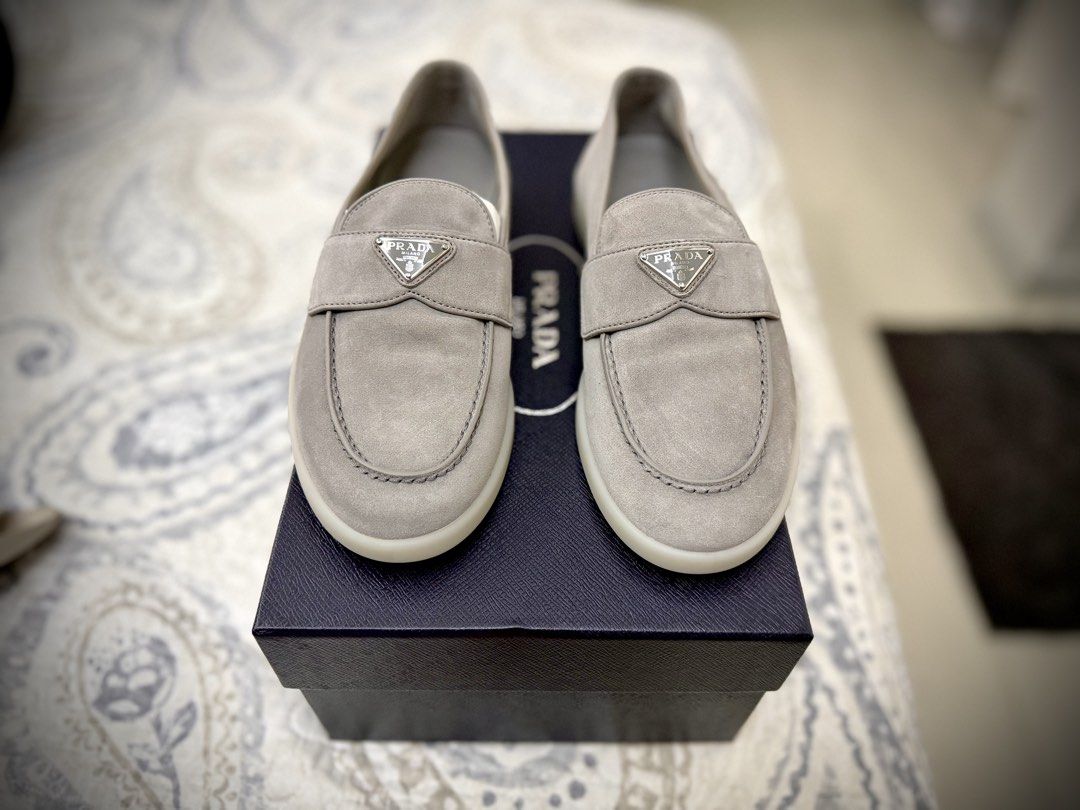 Prada Suede Loafer Cloudy Gray (Prada Sz: 5.5) (Category: Sneakers & Footwear) located in San Juan City. Submitted by fibercableguy (Listing ID 1467284732, Image 1). Description: BNew Original Prada Suede Loafer in Cloudy Gray Prada Size: 5.5 (EU 39.5) - Shoes are UNUSED, never been worn. - RFS: too small Back story: Went to Japan, saw this model in another color, tried a Prada Size 6.0, initially thought its too big. Size 5.5 is not available in